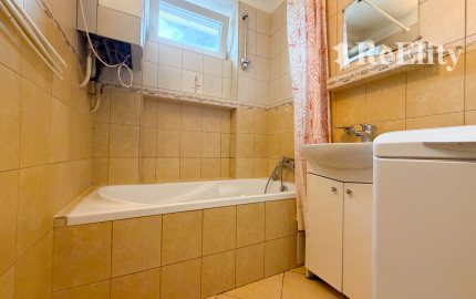ZNÍŹENÁ CENA 3-izbový byt so záhradou, altánkom a garážou vo Vrútkach